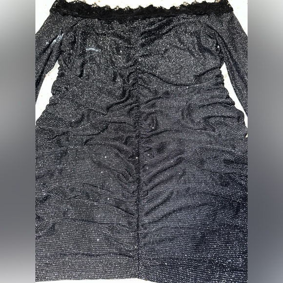 Fitted, black mini dress with sparkle - Picture 3 of 4